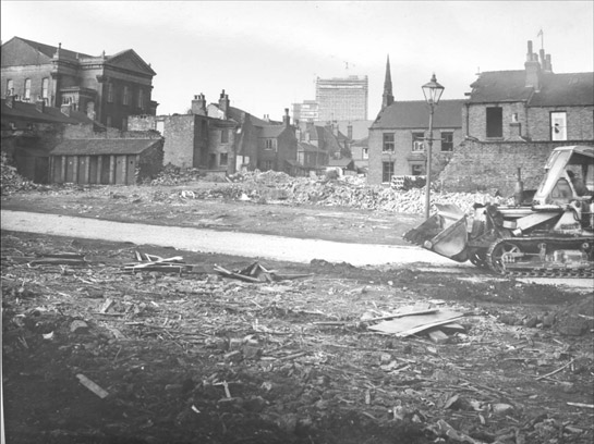 Figure 7: Demolition of Aberdeen Street in Broomhall in advance of the construction of the inner ring road and Hanover Estate in 1964 – note the half built University Arts Tower in the background © SCC